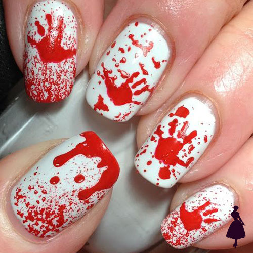 Diseños de uñas para halloween manos sangre
